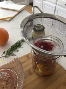 straining blood orange juice for vinaigrette