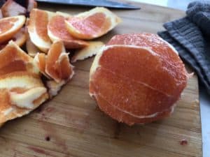orange with skin removed ready to slice for salad