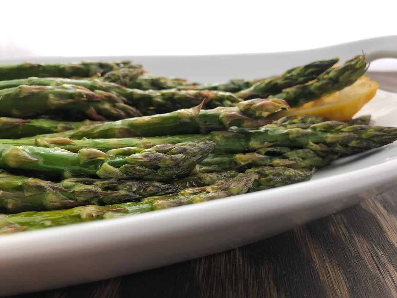 lemon roasted asparagus on serving platter