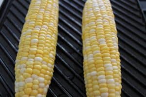 ears of corn on griddle pan