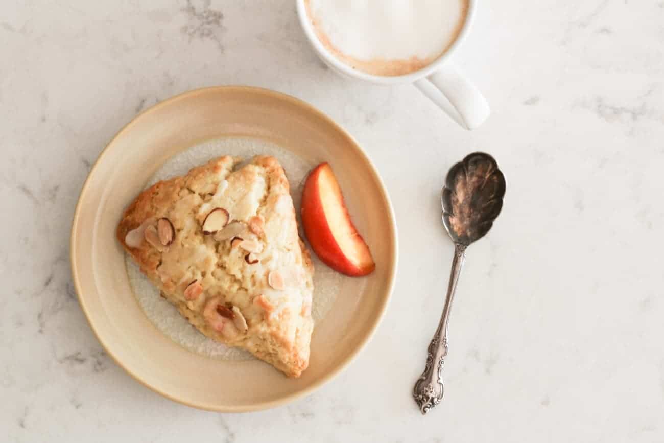 almond peach scone with cappuccino