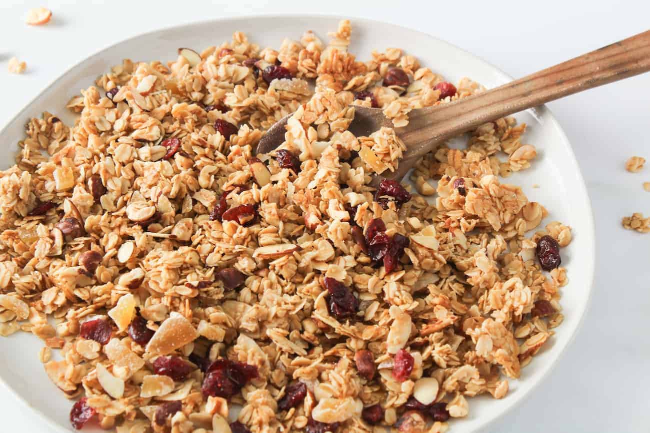 ginger cranberry granola on a white plate