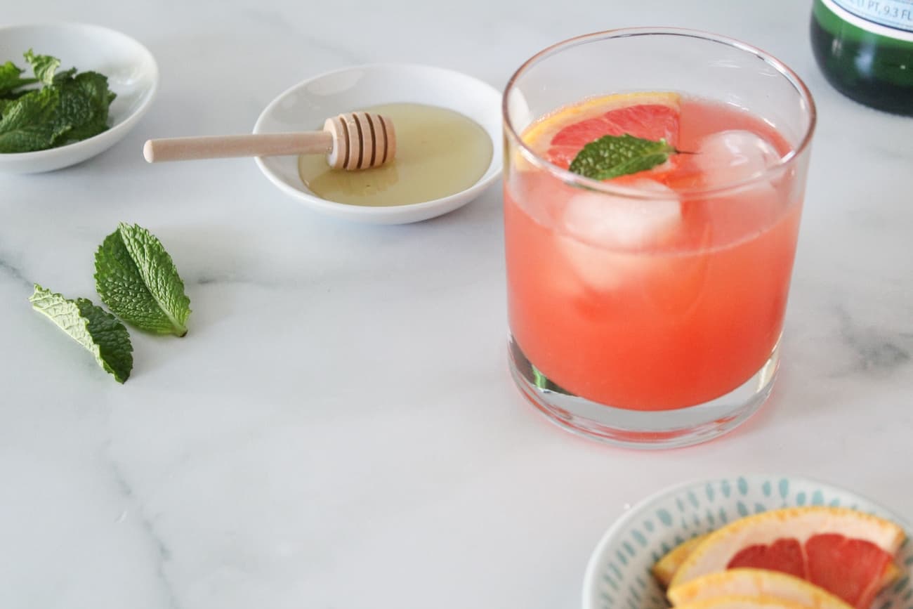 grapefruit cocktail with garnishes